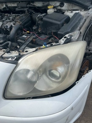 Фара лампа перед toyota avensis t25 левая фото №1