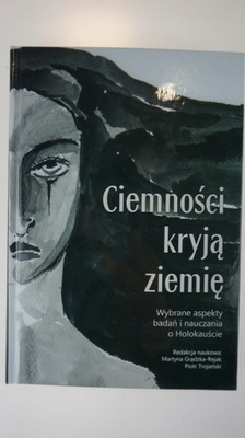 Ciemności kryją ziemię Martyna Grądzka-Rejak