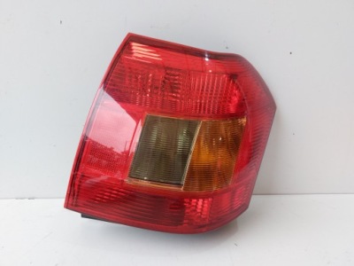 Toyota corolla e12 лампа правая задний  оригинал фото №1
