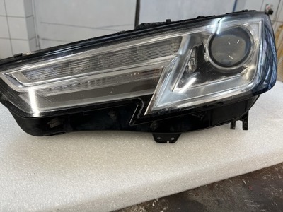 Лампа ліва audi a4 b9 ксенон 8w0941005 фото №1