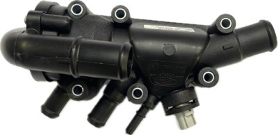 Термостат жидкость ford фото №1