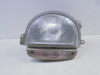 RENAULT TWINGO I REFLEKTOR LEWY H4 7701036395
