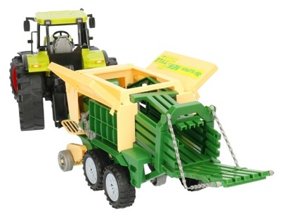 Traktor z prasą koskującą 5575