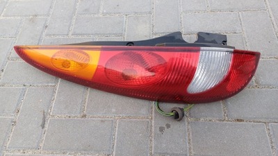Nissan almera tino лампа левая задняя задняя фото №1
