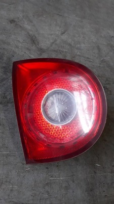 Лампа левая задняя с крышки vw golf v фото №1