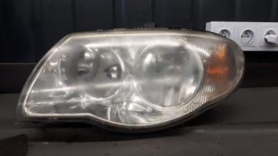 04857831ab фара левый chrysler grand voyager фото №1