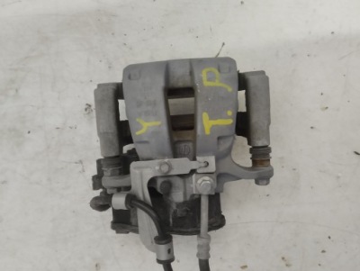 Tesla model y супорт гальмівний правий задній фото №1