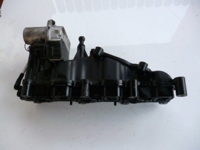 Audi оригінальний номер 059129711 колектор впускний фото №1