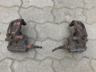 Супорти гальмівні лівий правий задня audi a4 b8 фото №1