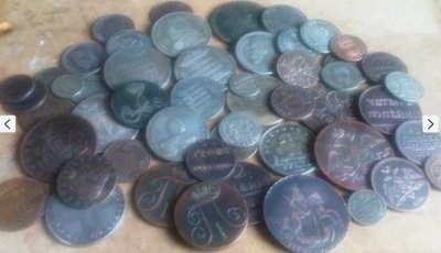 Sakiewka pełna monet - kopie 50 monet