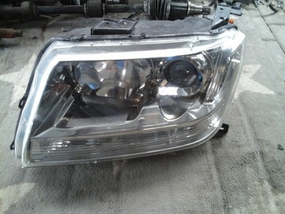 Suzuki grand vitara лампа левая обычная przed lift фото №1