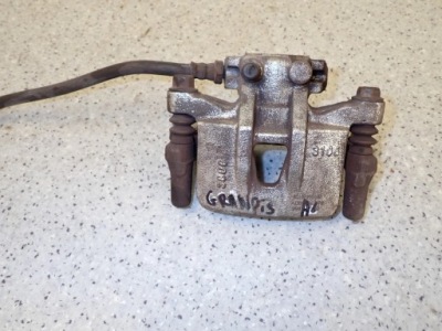 Mitsubishi grandis 03-11 суппорт тормозной задний левый фото №1