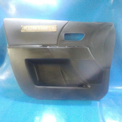 Обшивка оббивка двері лівий перед mazda 5 05-10r. фото №1