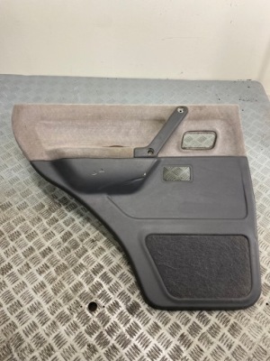 Оббивка двері лівий задня mitsubishi pajero ii 5d mr776441 фото №1