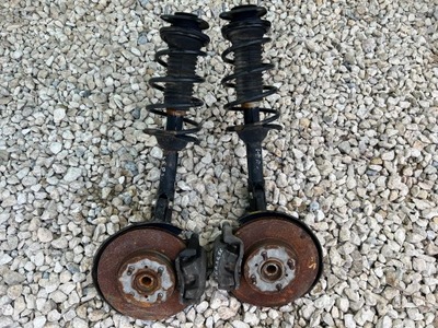 Toyota yaris i verso поворотний кулак амортизатор правий перед фото №1