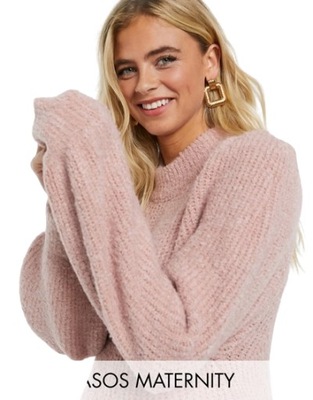 Różowy sweter oversize z obszernymi rękawami 36