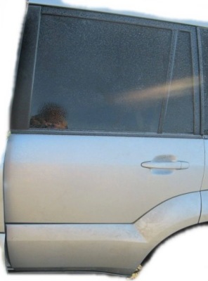 Toyota land cruiser 120 j120 двері ліва задні задня фото №1