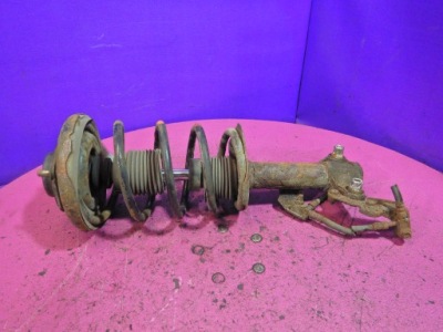 Primera p12 1,8 амортизатор mcperson перед левый фото №1