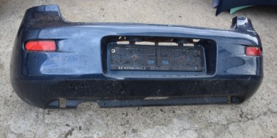 Бампер задній задня mazda 323c 12k фото №1