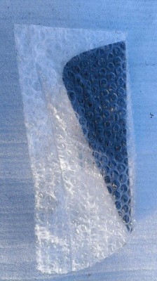 Заглушка трикутник двері лівий задня dacia duster ii 990476871r фото №1