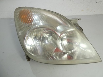 Лампа фара правий перед toyota corolla verso i фото №1