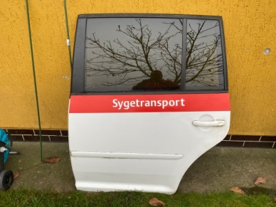 Vw touran lift 10-15 двері ліва задні повний фото №1