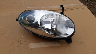 Nissan micra 06-08 лампа ліва перед фото №1