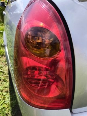 Nissan primera p12 лампа задня задня ліва + вкладиш kombi ładna фото №1