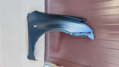 Corolla e12 hb 02-07 крила напрямна перед r oryg. фото №1