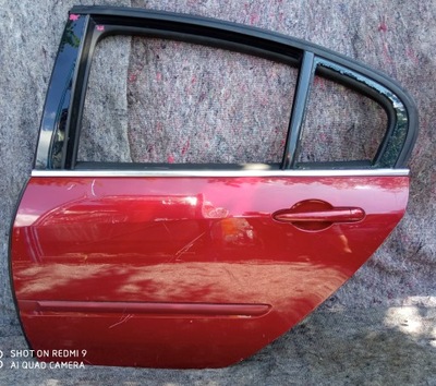 Renault laguna iii hb двері ліва задня фото №1