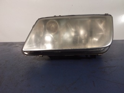 Vw bora фара лівий eu 693597-00l2 фото №1