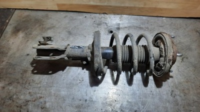 Амортизатор левый перед mazda 323f 00r фото №1