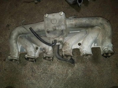 Колектор всмоктуючий bmw 7 e32 1717402 3.5l 1987 фото №1
