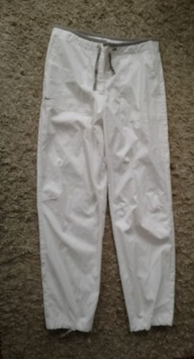 Spodnie białe Nike M damskie