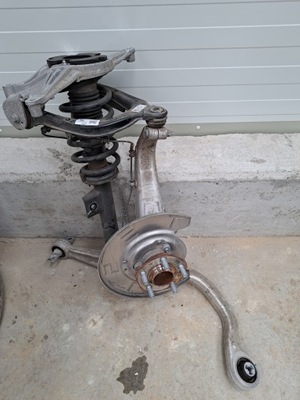 Tesla iii model 3 поворотний кулак перед rwd важелі амортизатор лівий перед фото №1