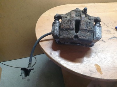 Суппорт тормозной левый перед hyundai ix35 1.7 фото №1