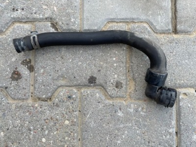 Opel corsa d патрубок шланг води 13249356 фото №1