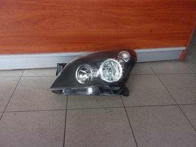 Лампа фара opel astra h левая фото №1