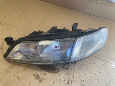 Opel vectra b лампа правая правый перед 90464145 фото №1