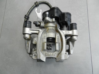 Bmw оригінальний номер 6798957 супорт гальмівний фото №1