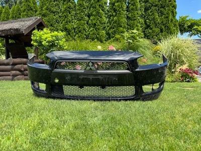 Mitsubishi lancer x sedan 09- бампер передній + решітка радіатора оригінал фото №1