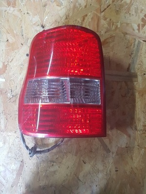 Лампа ліва задня kia carnival i 2003r фото №1