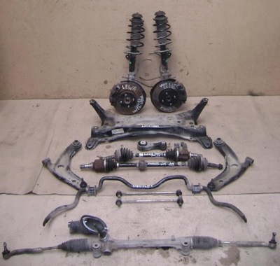 Toyota yaris iv 1,5 mcperson лівий перед поворотний кулак амортизатор 48520-0d480 фото №1