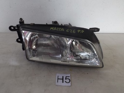 Mazda 626 лампа правий перед фото №1