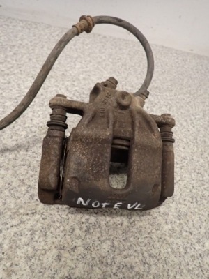 Nissan note e11 супорт гальмівний перед лівий фото №1