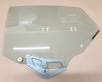 Скло двері лівий задня mazda 323 фото №1