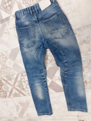 H&M 128 7 8 lat jeans przetarcia dziury