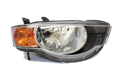 Фара mitsubishi colt 04-12 h4/p21w/ magneti marelli 710301249302 фото №1