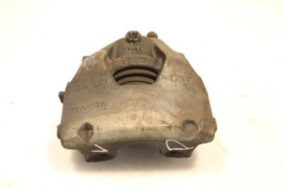 Суппорт тормоза левый перед toyota yaris iv фото №1