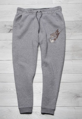 NIKE JUST SPODNIE JOGGERY DRESOWE DAMSKIE r XL